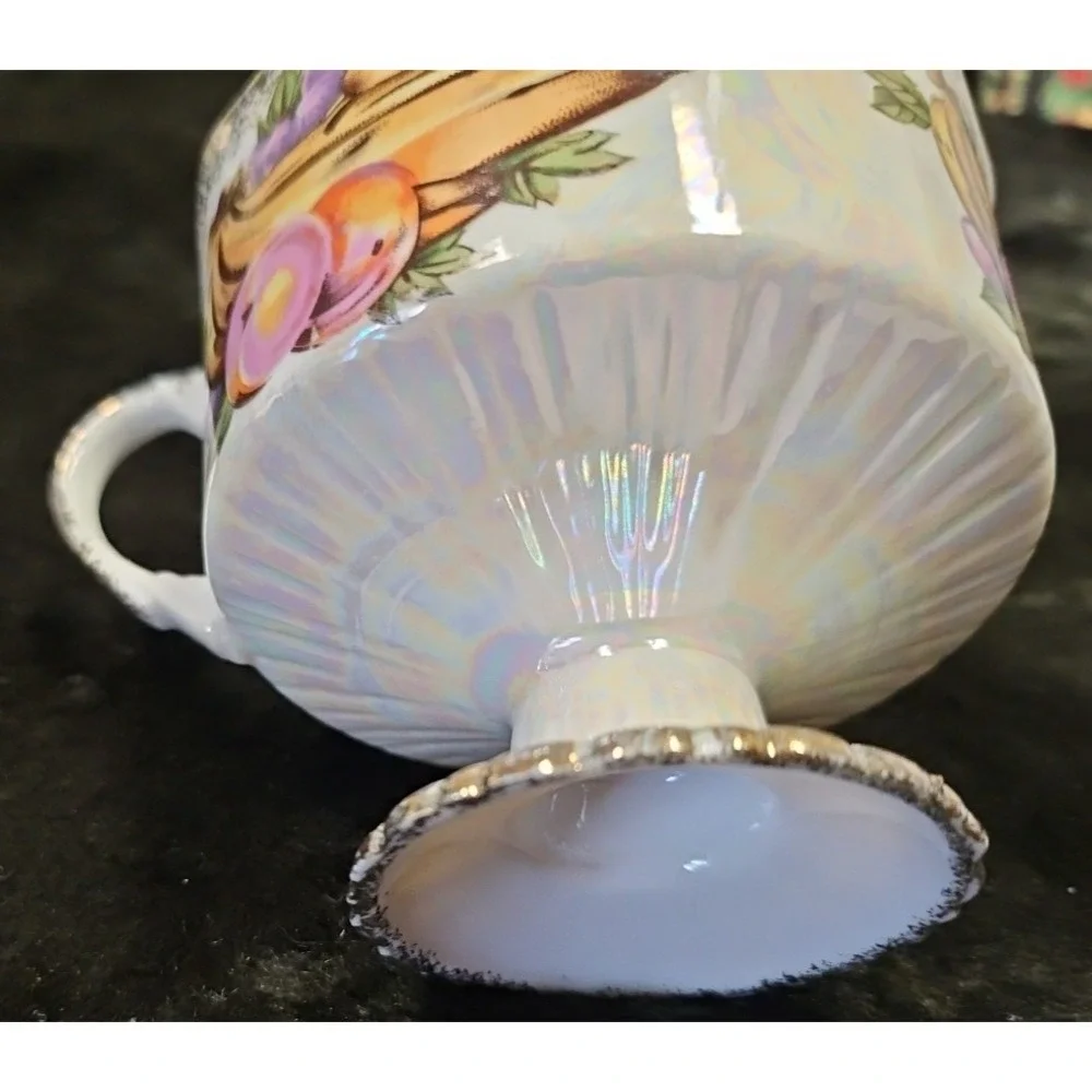 Lusterware Handpainted Fruit with gold finishings,‎ footed cup and saucer set
